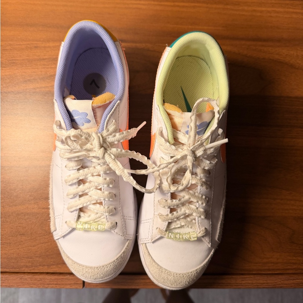 Nike White Sneakers with Orange and Purple Accents